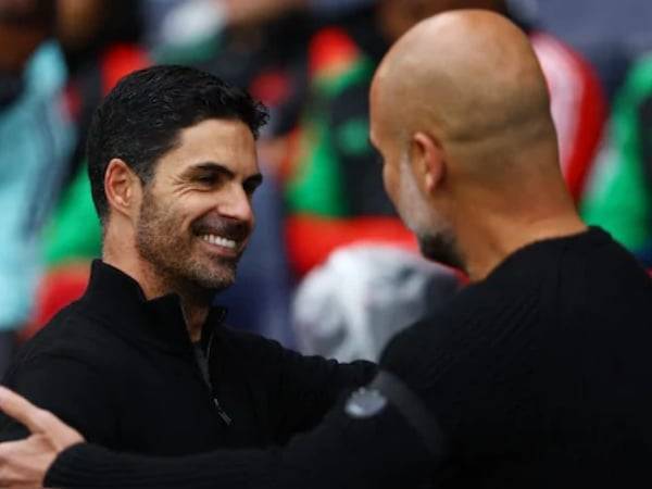 Mikel Arteta and Pep Guardiola