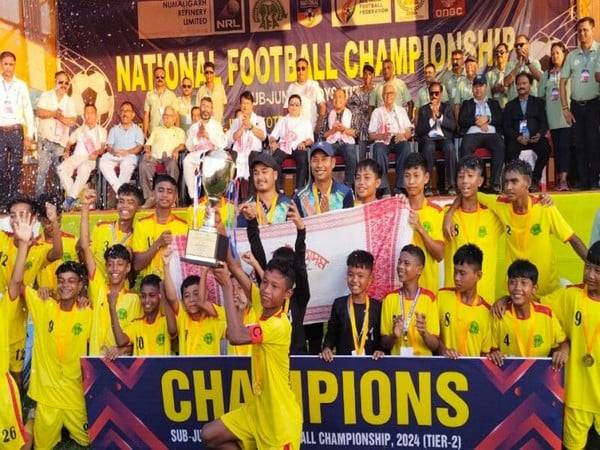 Assam team with the trophy. (Photo- AIFF Media)