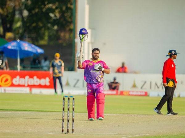 Mohammed Shahzad celebrating his fifty