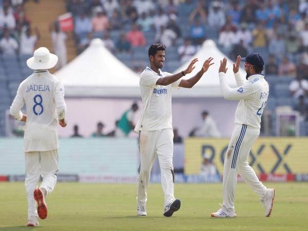 Washington Sundar celebrating with India skipper Rohit Sharma. (Picture: X/@BCCI)