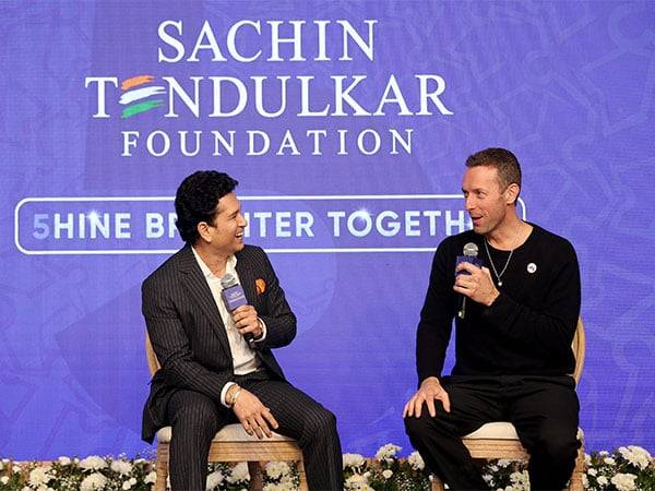 Sachin Tendulkar and Chris Martin (Photo: STF)