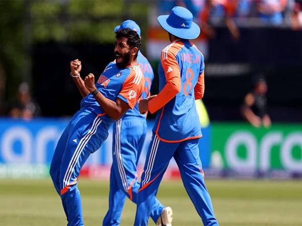 Jasprit Bumrah celebrating with teammates after taking a wicket (Photo: Olympics.com)