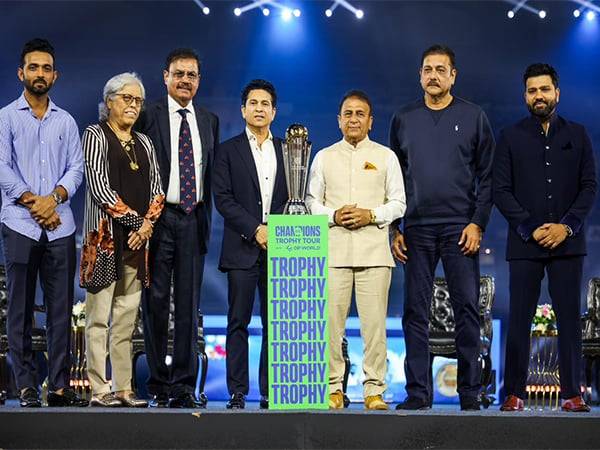 Dilip Vengsarkar, Ravi Shastri, Ajinkya Rahane, Sunil Gavaskar, Sachin Tendulkar, Diana Edulji, and Rohit Sharma with ICC Champions Trophy (Photo: ICC)