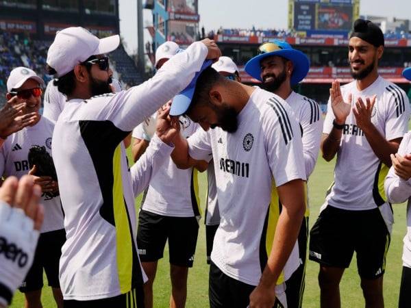 Varun Chakravarthy getting ODI debut cap from Ravindra Jadeja. (Photo- BCCI X/@BCCI)