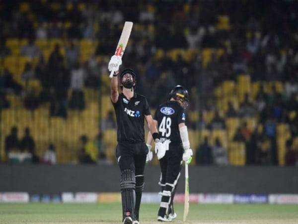 Daryl Mitchell raising his bat for his fifty. (Photo- Blackcaps X)