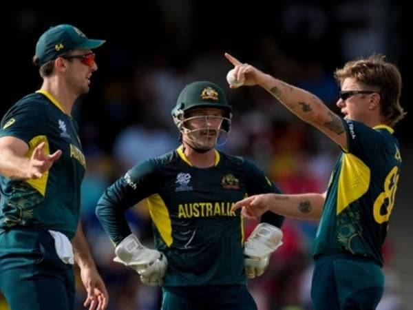 Adam Zampa took four wickets as Australia booked a place in Super 8