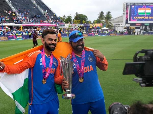 Rohit Sharma and Virat Kohli with the T20 World Cup 2024 trophy